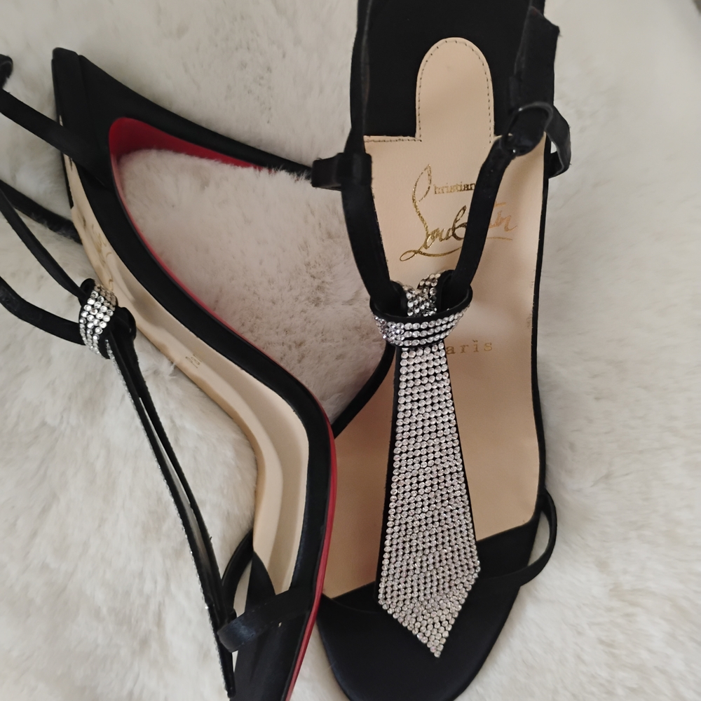 Christian Louboutin Black Heels with Diamond Bow tie accents. AUTHENTIC 💯